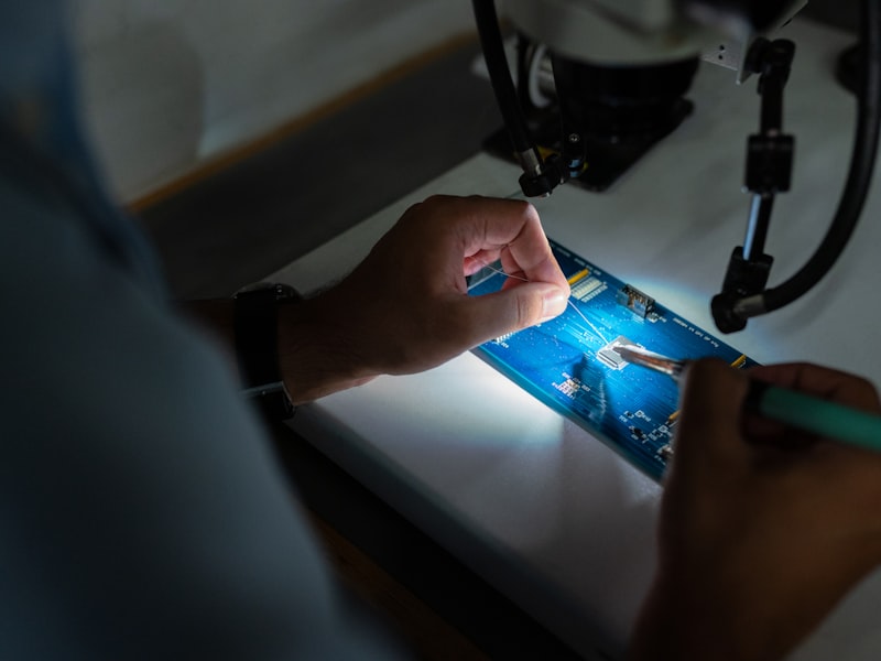 Technician repairing washing machine