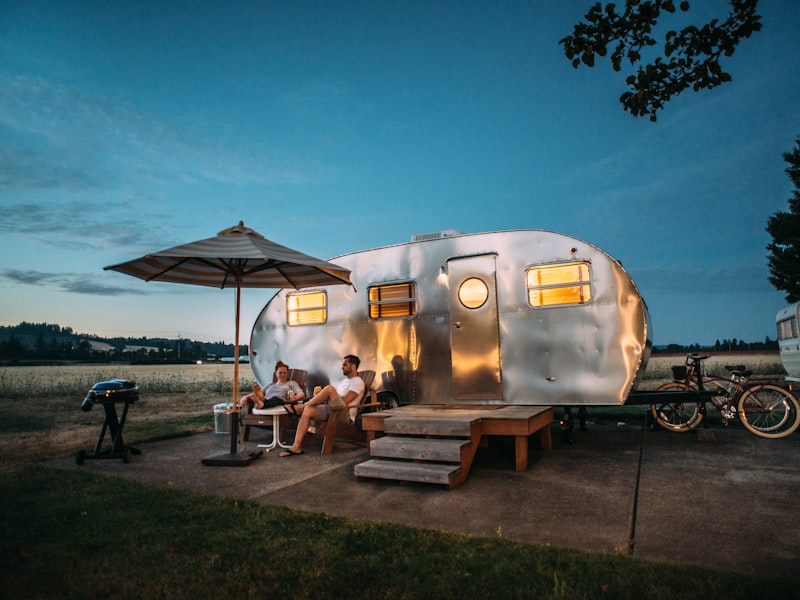 Family enjoying outdoor dining at a camp table