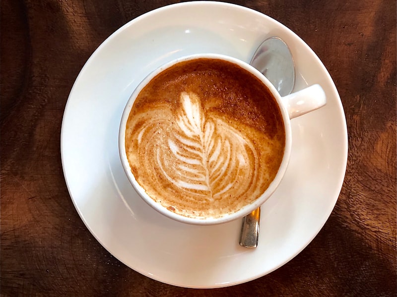 Colorful coffee capsules arranged in rows