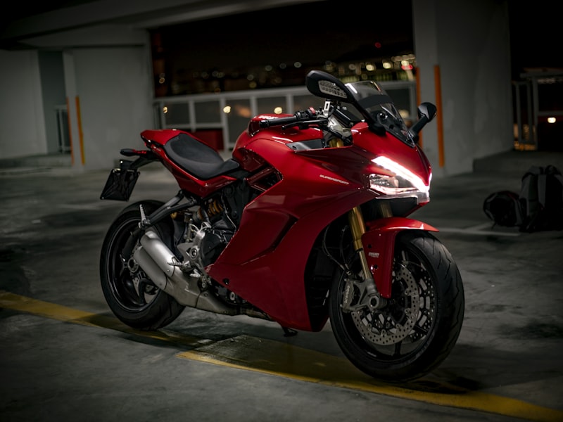 Vintage Vespa parked on narrow Italian street