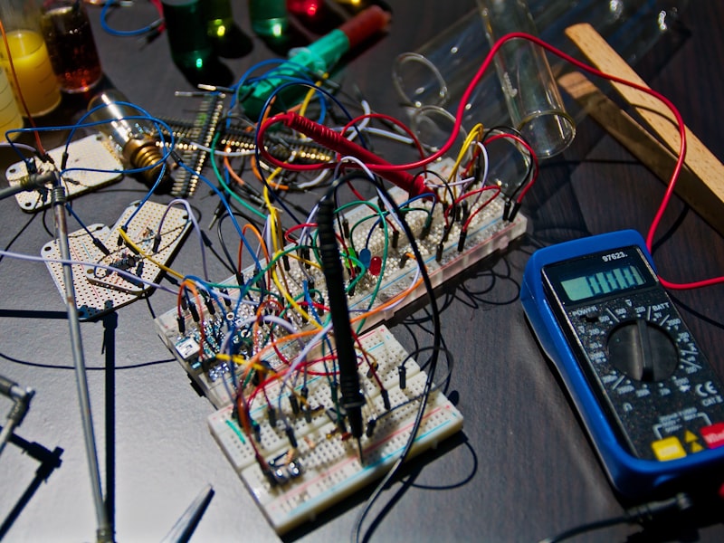 Welding helmet and gloves on workshop table
